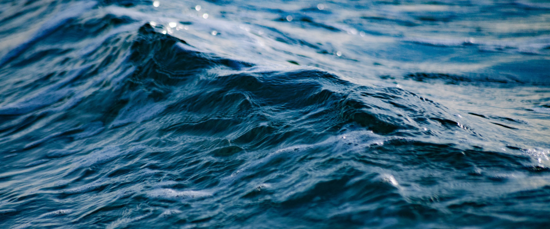 Close-up of a deep blue wave